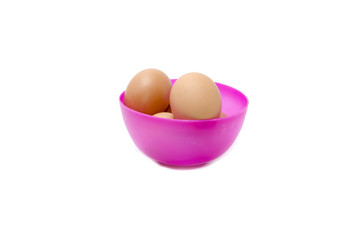 eggs in a purple bowl isolated