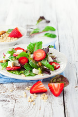 Spring salad with spinach leaves