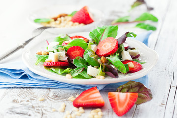 Spring salad with spinach leaves