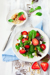 Spring salad with spinach leaves