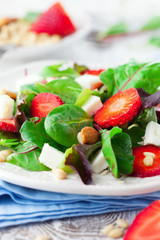 Spring salad with spinach leaves