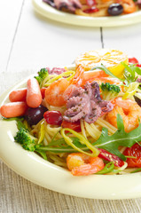Seafood spaghetti pasta dish with octopus and shrimps