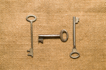 Three  old keys to the safe on a very old cloth