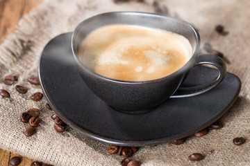 Coffee cup and coffee beans