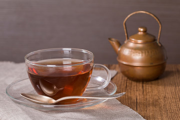 Cup of tea and a vintage teapot