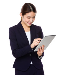 Young businesswoman holding a tablet
