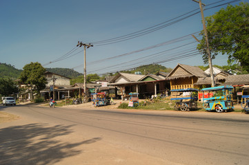 the daily life of a Thai village along the road