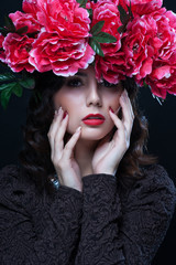 Naklejka premium Beautiful girl with flowers in her hair. Spring.
