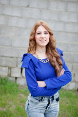 Obraz premium Attractive cool woman dressed in blue
