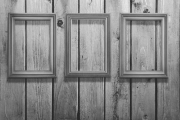 vintage photo-frames on wooden background