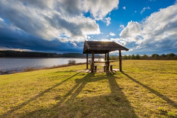 Landscape with wooden hut.