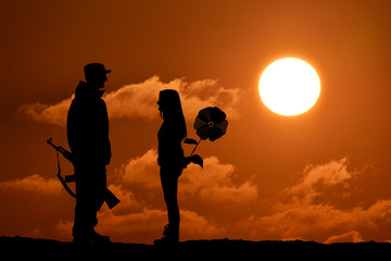Silhouette of peace and love versus war and anger. No war