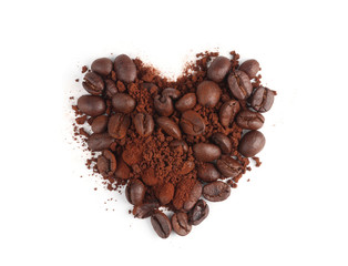 Coffee powder and beans in shape of heart