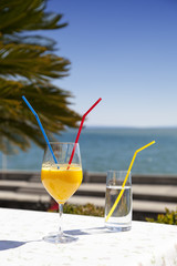 Glass of orange juice on the table