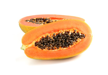 sweet papaya on the dish with green papaya leaf