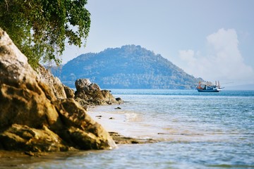 Beautiful sea view with island, mountain, tree and frigate