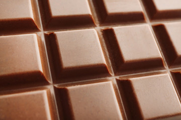 Milk chocolate bar close up