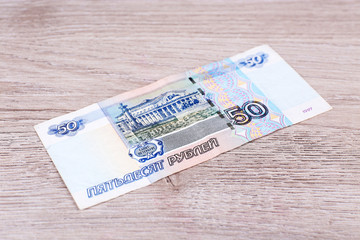 One denomination on wooden background