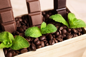 Still life with set of chocolate in wooden box of coffee