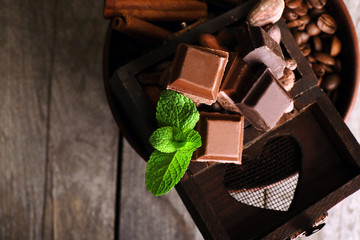 Still life with set of chocolate, coffee beans and spice