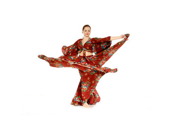 Young beautiful woman dancing gypsy dance