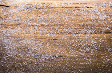 wooden background with snow