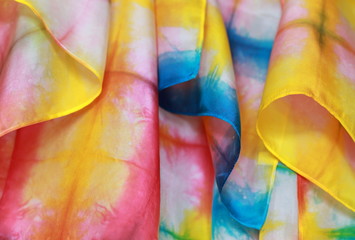 Rippled surface of light silk dyed in shades of the rainbow - 80848957