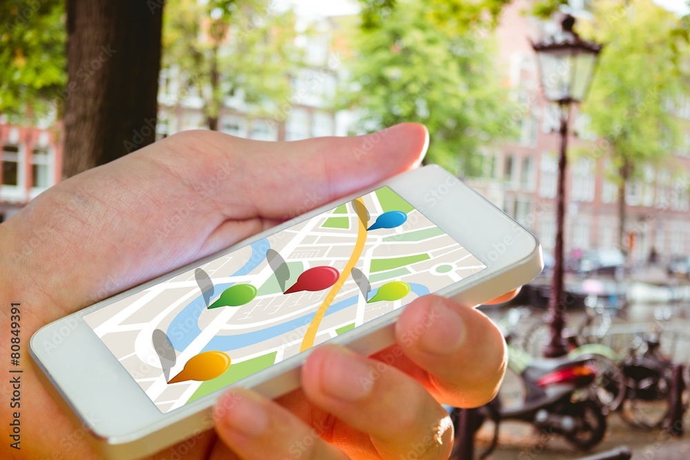 Aufkleber Composite image of man using map app on phone