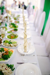 Banquet wedding table setting on evening reception