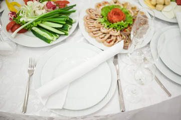 Banquet wedding table setting on evening reception
