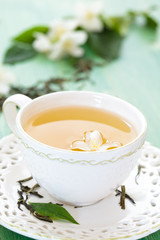 Green tea and jasmine.