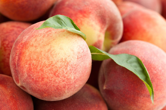 Fresh peaches background.