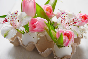 Fototapeta na wymiar Easter decoration with flowers