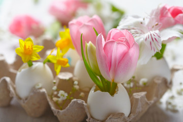 Fototapeta na wymiar Easter decoration with flowers