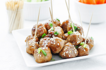 meatballs with Teriyaki sauce and sesame seeds