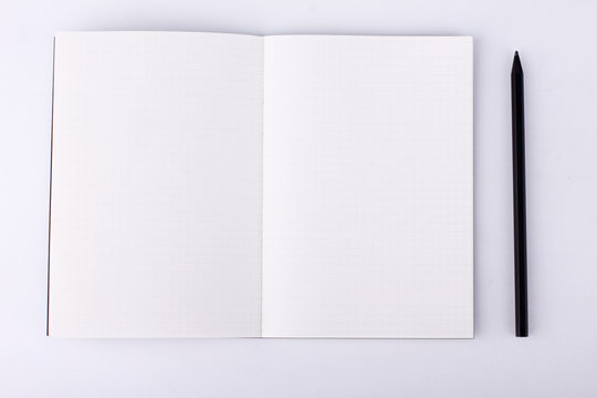 Open notebook on white background