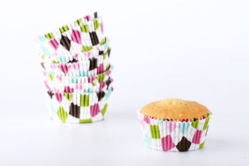 Stack of colorful cupcake cases