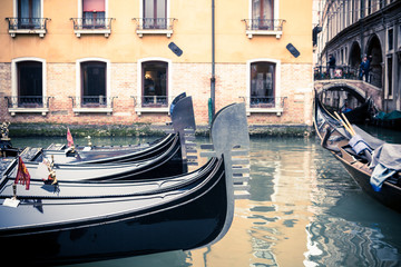 Fototapeta na wymiar Gondolas on a Canal in Venice