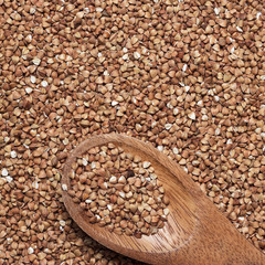 buckwheat with brown wooden spoon