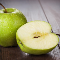 fresh green apples on the table