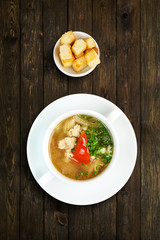 Restaurant food - white fish soup with croutons