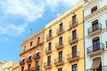 Colorful living houses facades. Street view of Tarragona