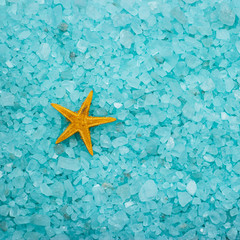 Fototapeta na wymiar aromatic bath salt and starfish background