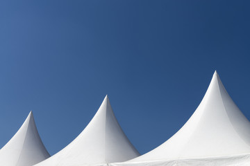 White tent on blue sky © Francesco