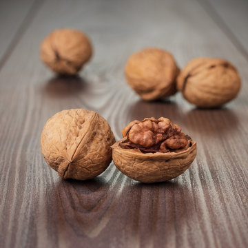 walnuts on the brown wooden table