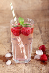 strawberry drinks on wood background