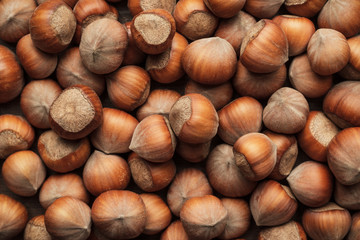 hazelnuts on the brown wooden table