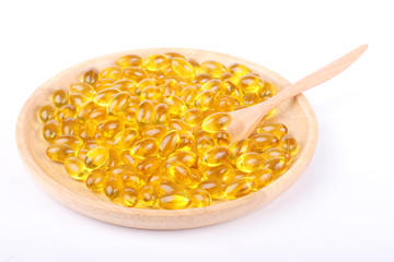 plate of vitamin capsules