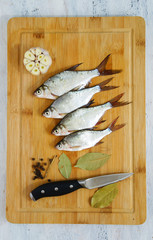 fresh water fish - bream with garlic and spices