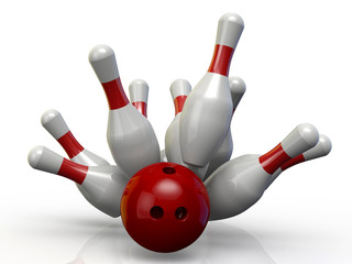 Bowling ball knocks down pins